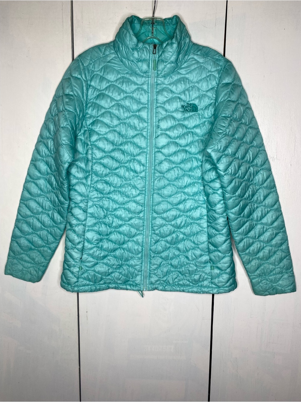 The North Face zip up puffer jacket size large